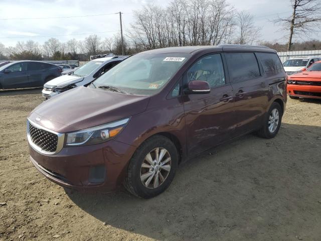 KNDMB5C15H6313180 - 2017 KIA SEDONA LX MAROON photo 1
