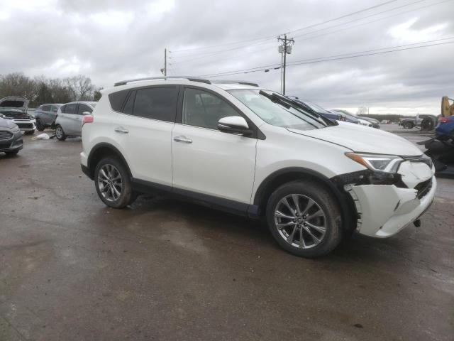 JTMDFREV3HJ715143 - 2017 TOYOTA RAV4 LIMITED WHITE photo 4