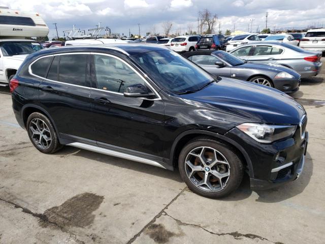 WBXHU7C56K3H45950 - 2019 BMW X1 SDRIVE28I BLACK photo 4