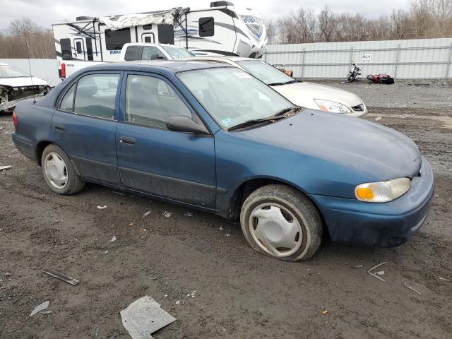 1Y1SK5286YZ430699 - 2000 CHEVROLET GEO PRIZM BASE BLUE photo 4
