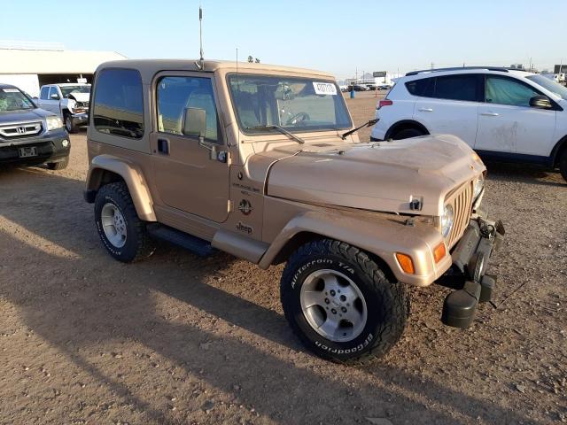 1J4FY49S8XP469010 - 1999 JEEP WRANGLER / SAHARA GOLD photo 4