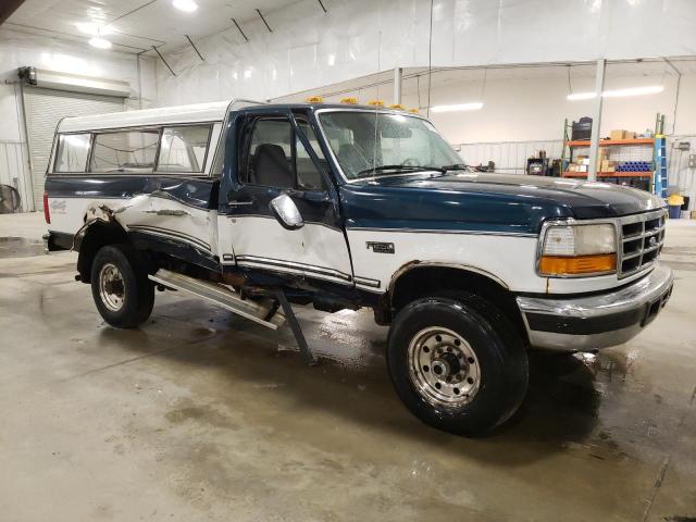 1FTHF26H9VEB11537 - 1997 FORD F250 TEAL photo 4