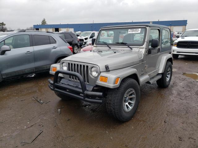 1J4FA49S91P344738 - 2001 JEEP WRANGLER / SPORT GRAY photo 1