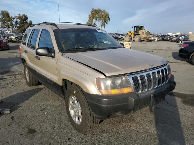 1J4G248S9YC233918 - 2000 JEEP GRAND CHER LAREDO GOLD photo 1