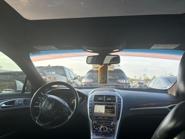 3LN6L5FC8HR617881 - 2017 LINCOLN MKZ RESERVE თეთრი ფოტო 9