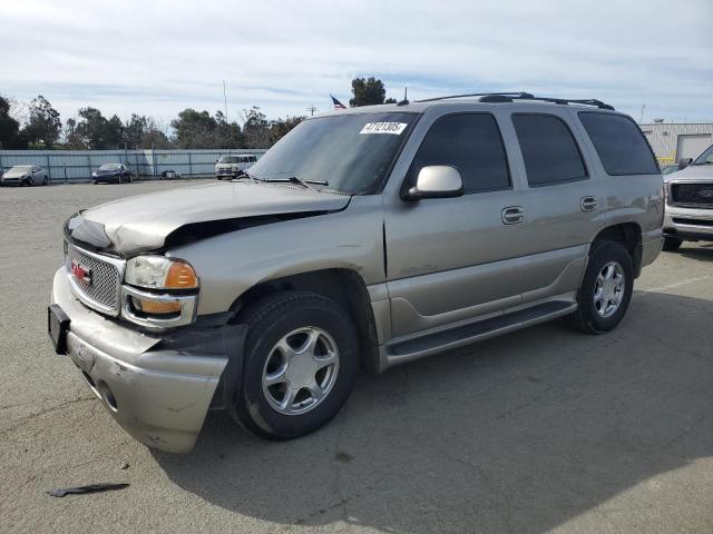 1GKEK63UX2J325533 - 2002 GMC DENALI GOLD photo 1