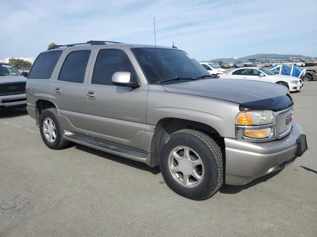 1GKEK63UX2J325533 - 2002 GMC DENALI GOLD photo 4