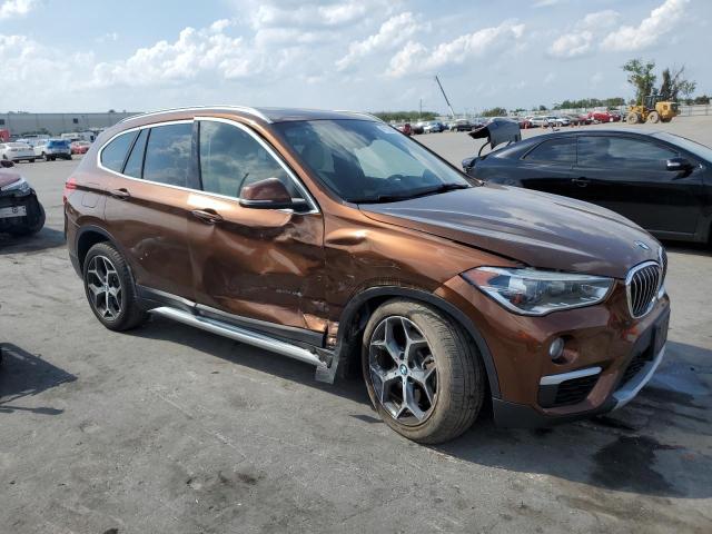 WBXHU7C31H5H33300 - 2017 BMW X1 SDRIVE28I BROWN photo 4