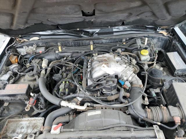 JN8AR07Y1YW396460 - 2000 NISSAN PATHFINDER LE 绿色 照片 12