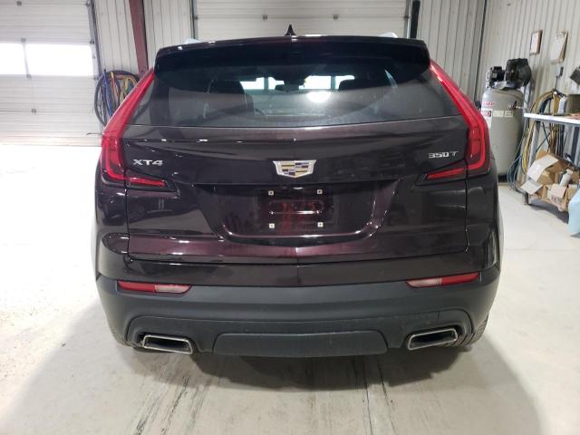 1GYAZAR4XMF012272 - 2021 CADILLAC XT4 LUXURY BURGUNDY photo 6