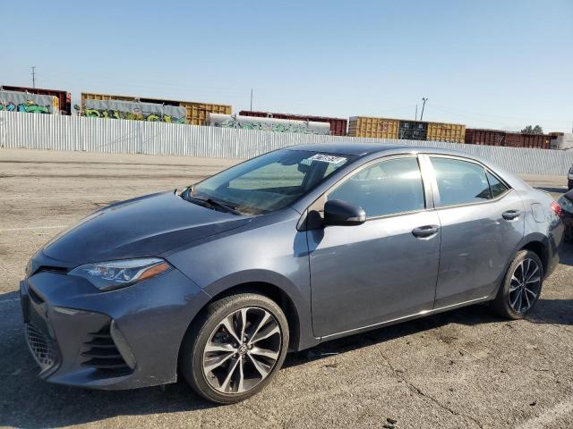 5YFBURHEXHP592915 - 2017 TOYOTA COROLLA L GRAY photo 1