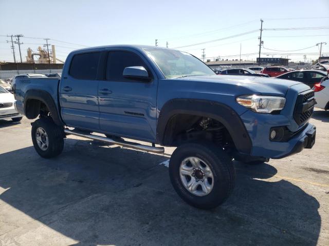 5TFAX5GN2KX135246 - 2019 TOYOTA TACOMA DOUBLE CAB BLUE photo 4