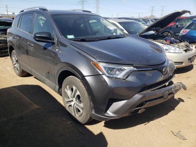 JTMBFREV5JD242048 - 2018 TOYOTA RAV4 LE GRAY photo 4