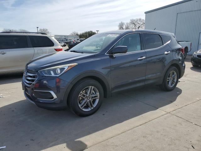 5NMZT3LB0JH097778 - 2018 HYUNDAI SANTA FE S BLUE photo 1