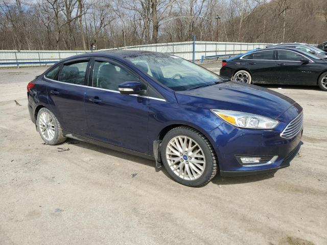 1FADP3J20HL213545 - 2017 FORD FOCUS TITANIUM BLUE photo 4