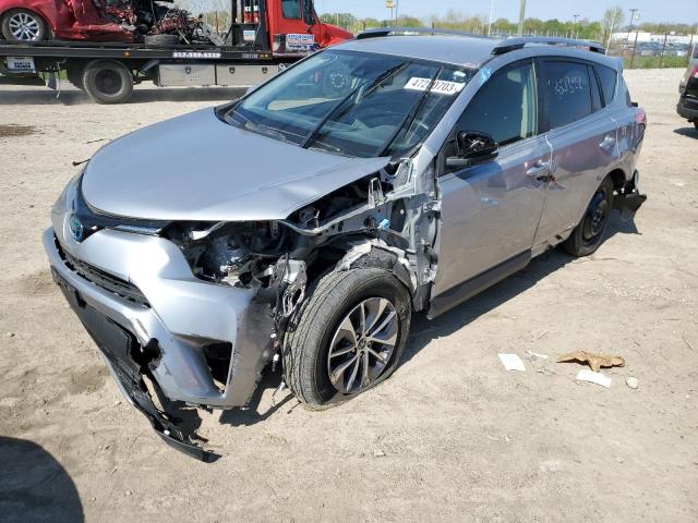 JTMRJREV1JD197123 - 2018 TOYOTA RAV4 HV LE SILVER photo 1