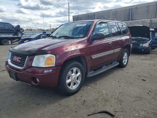 1GKDT13S732389048 - 2003 GMC ENVOY BURGUNDY photo 1