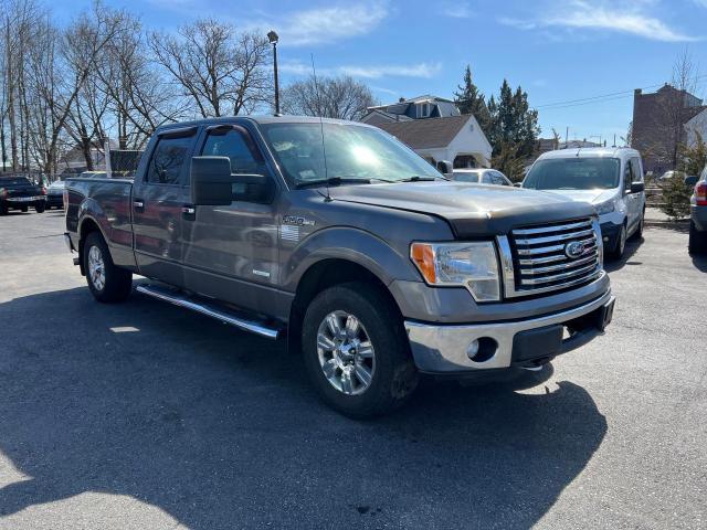 1FTFW1ET0CKD72142 - 2012 FORD F150 SUPERCREW GRAY photo 1