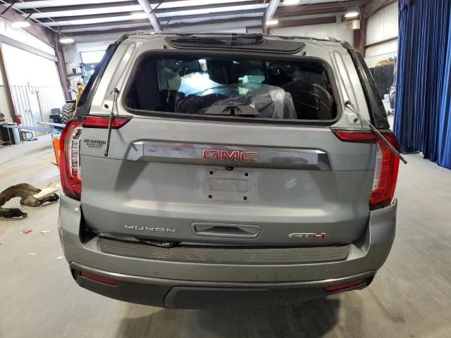 1GKS2CKD0PR136319 - 2023 GMC YUKON AT4 GRAY photo 6