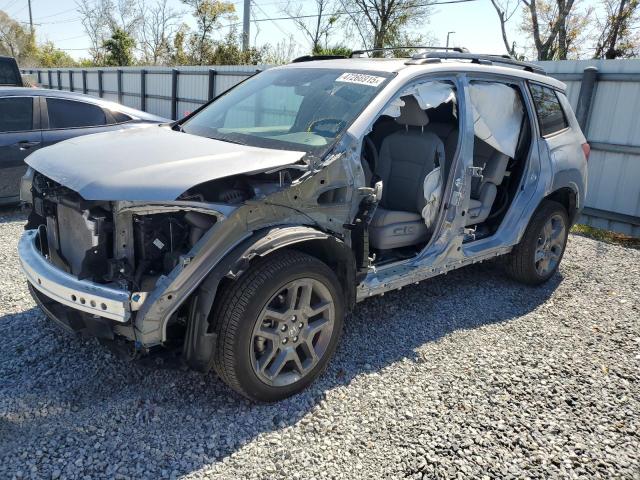 5FNYF8H54PB040111 - 2023 HONDA PASSPORT EXL SILVER photo 1