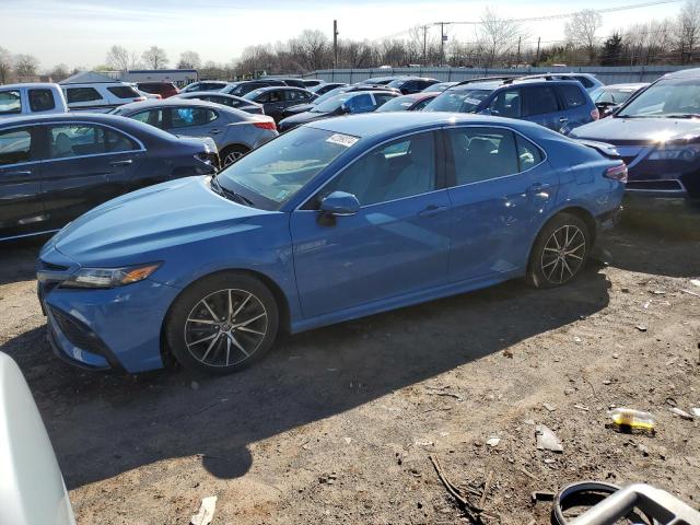 4T1T11BK1PU093978 - 2023 TOYOTA CAMRY SE NIGHT SHADE BLUE photo 1