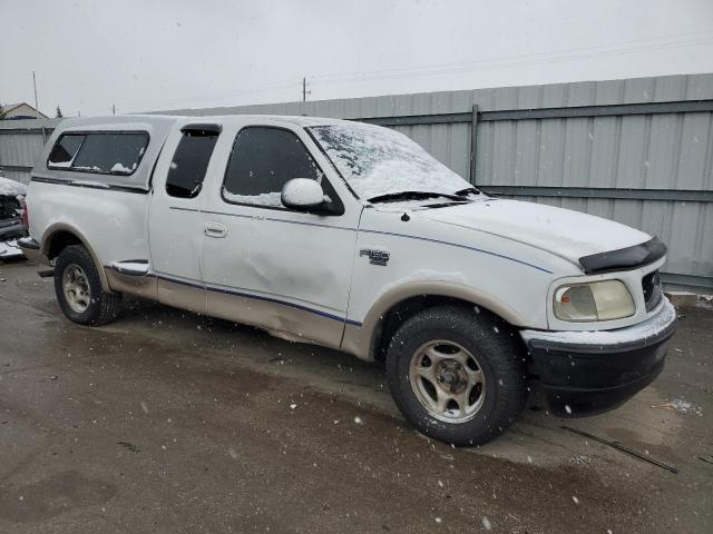 2FTZX0760WCA75702 - 1998 FORD F150 WHITE photo 4
