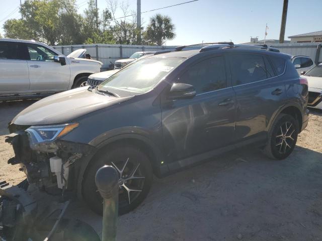 JTMJFREV6GJ055164 - 2016 TOYOTA RAV4 SE GRAY photo 1