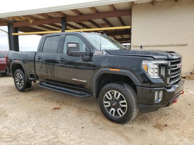 1GT49PEY0MF317410 - 2021 GMC SIERRA K2500 AT4 BLACK photo 4