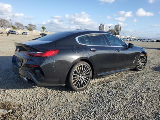 WBAGV8C00MCF81403 - 2021 BMW M850XI Siyah fotoğraf 3