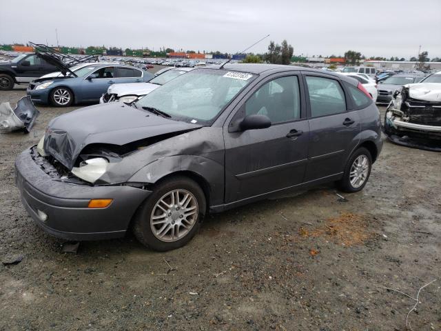 3FAFP37374R119666 - 2004 FORD FOCUS ZX5 GRAY photo 1