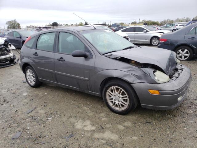 3FAFP37374R119666 - 2004 FORD FOCUS ZX5 GRAY photo 4