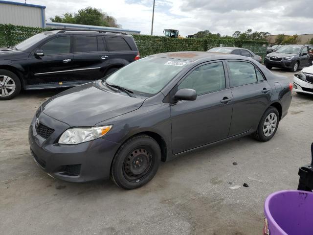 1NXBU40E09Z064007 - 2009 TOYOTA COROLLA BASE GRAY photo 1