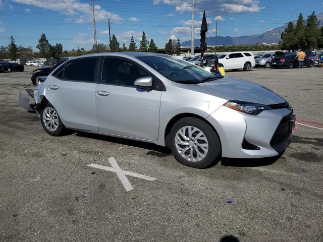 5YFBURHE4HP587435 - 2017 TOYOTA COROLLA L SILVER photo 4