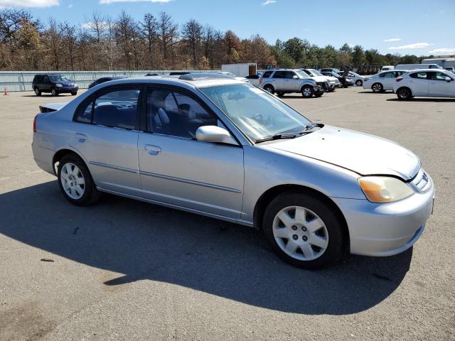 2HGES26732H504820 - 2002 HONDA CIVIC EX SILVER photo 4