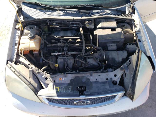 1FAFP34N65W282619 - 2005 FORD FOCUS ZX4 SILVER photo 11