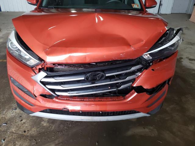 KM8J3CA20HU387095 - 2017 HYUNDAI TUCSON LIMITED ORANGE photo 12