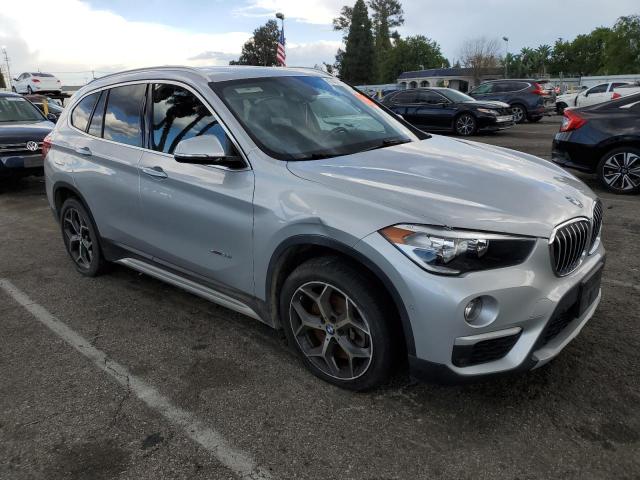 WBXHT3Z36J4A67016 - 2018 BMW X1 XDRIVE28I SILVER photo 4