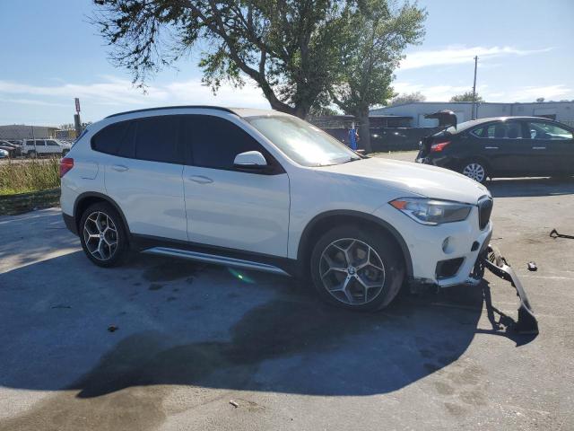 WBXHU7C30H5H37872 - 2017 BMW X1 SDRIVE28I WHITE photo 4