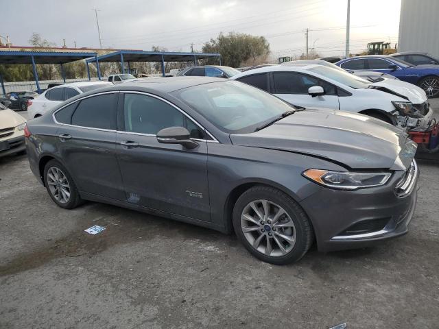 3FA6P0PU9JR110275 - 2018 FORD FUSION SE PHEV GRAY photo 4