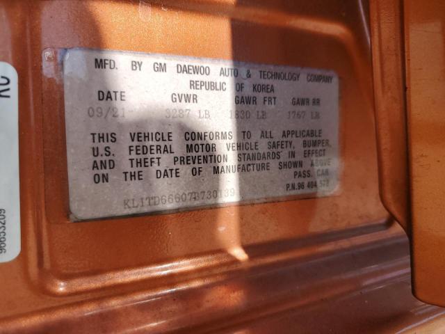 KL1TD66607B730139 - 2007 CHEVROLET AVEO BASE ORANGE photo 12