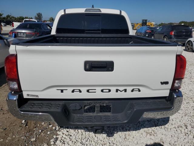 3TMAZ5CN8JM063912 - 2018 TOYOTA TACOMA DOUBLE CAB WHITE photo 6