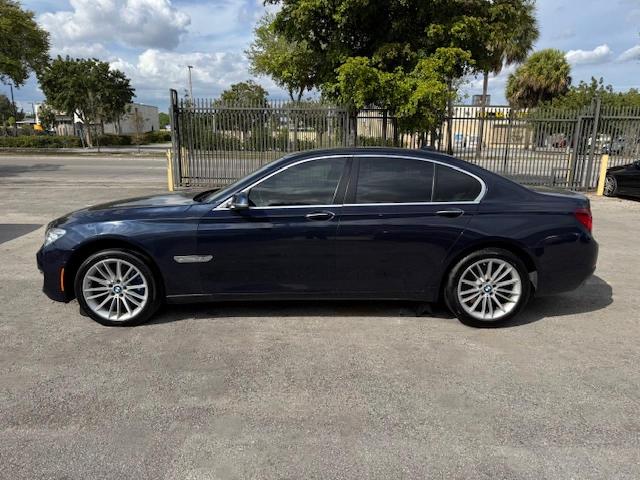 WBAYB6C5XFD965910 - 2015 BMW 750 XI BLUE photo 12