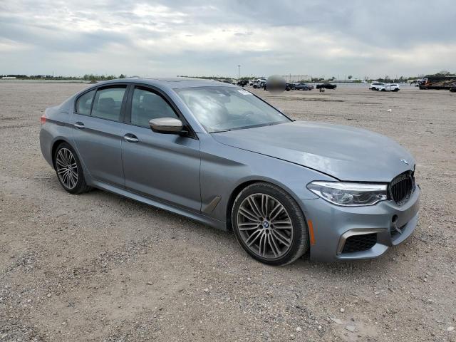 WBAJB9C5XJB034752 - 2018 BMW M550XI GRAY photo 4