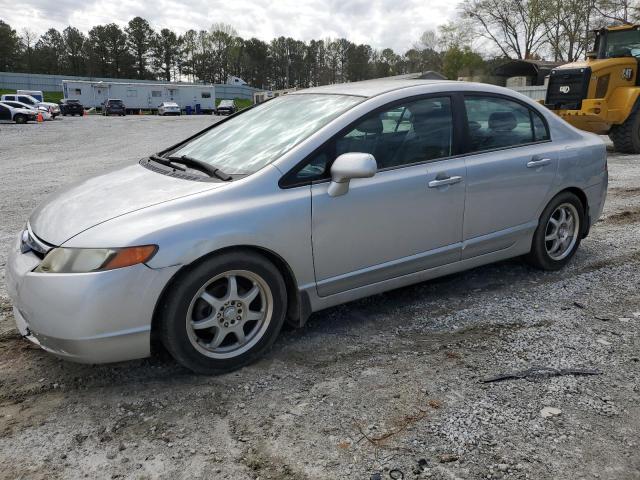 1HGFA16556L081473 - 2006 HONDA CIVIC LX SILVER photo 1