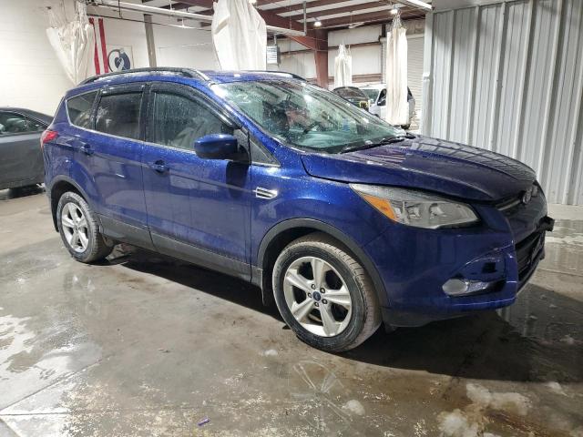 1FMCU9GX4FUA30818 - 2015 FORD ESCAPE SE BLUE photo 4