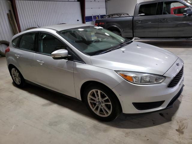 1FADP3K25GL331619 - 2016 FORD FOCUS SE SILVER photo 4