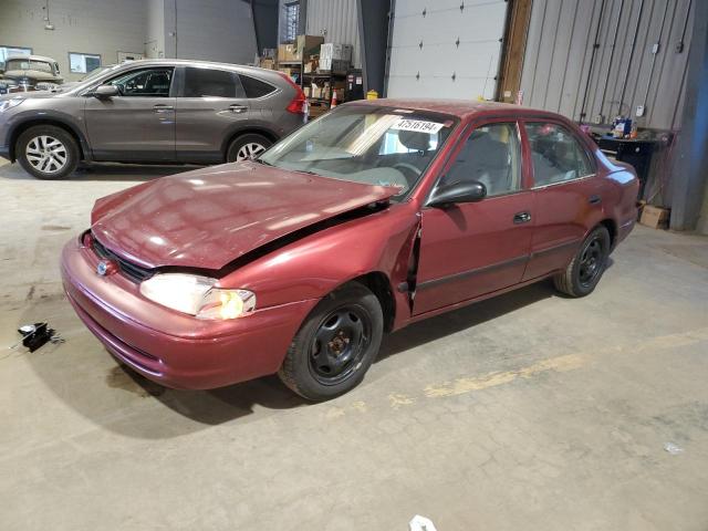 1Y1SK5280XZ449215 - 1999 CHEVROLET GEO PRIZM BASE RED photo 1