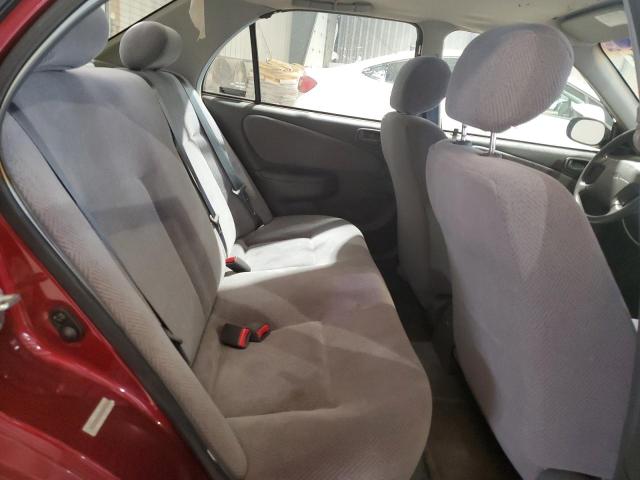 1Y1SK5280XZ449215 - 1999 CHEVROLET GEO PRIZM BASE RED photo 10