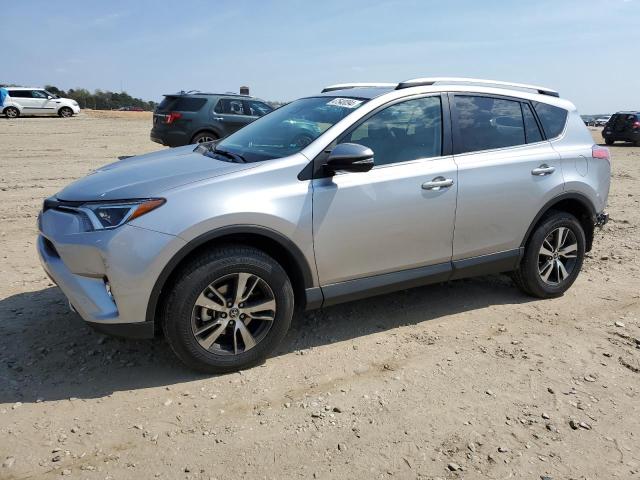 2T3WFREV3GW291052 - 2016 TOYOTA RAV4 XLE SILVER photo 1