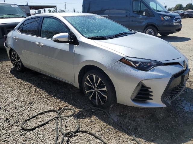 5YFBURHE6HP593995 - 2017 TOYOTA COROLLA L SILVER photo 4